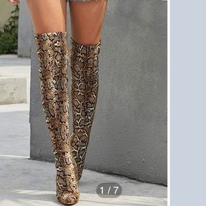 Thigh high snake skin boots